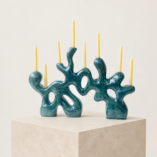 Blue Water Candelabra on a pale limestone plinth
